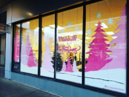 Outdoor window art mural for commercial retail businesses.