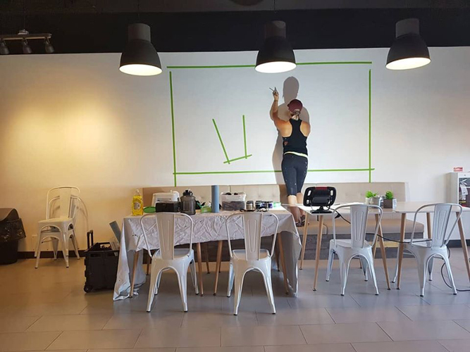 Professional mural designer at work